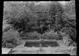 Alcove with statue of Pan in garden of Mrs. W. H. Cary