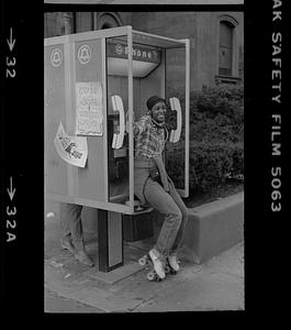 Roller skater phone caller on Boylston Street, Boston