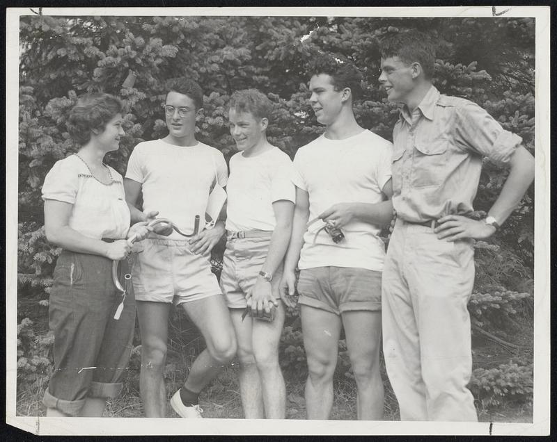 Winners of Harvard Bicycle Race-The winners of a race from Harvard to Wellesley College campus shown receiving their award from Miss Nancy Plowman of Wellesley (left) while Robert Lawthers, president of the Harvard Outdoor Club (right), looks on. The winners, left to right, are Vaclav Benes, grandnephew of the premier of Czechoslovakia; Richard H. Bryant, and James Hornig, all members of the Outdoor Club.