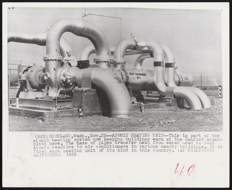 Atomic Heating Unit -- This is part of the atomic heating system now keeping buildings warm at the Hanford atomic plant here. The maze of pipes transfer heat from water used to cool atomic reactors to air conditioners in various nearby buildings. It is first such heating unit of its kind in this country.