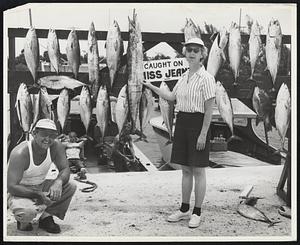 Miss M. A. Dickey, 49 Melcher St., Boston, Mass., with her 22# wahoo & other fish caught from Capt. Johnny Whitmer's charter boat "Miss Jeane II", lighthouse Yacht Basin, Pompano Beach, Fla.