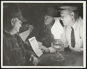 Read of Power Fight by Lamplight. Three citizens of Thayer, Mo., an Ozarks town of 2000, read a power fight pamphlet by lamplight. The dodger was issued in a connection with discontinuance of electrical service by the Arkansas-Missouri Power corporation. Lights were ordered on again in public service commission ruling April 16. Left to right: Frank Preston, Painter Collier and Homer Bone. Thayer is building a municipal power plant.