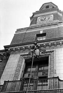 Rappelling down City Hall