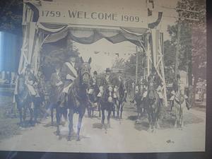 Black and white photo of horseback riders