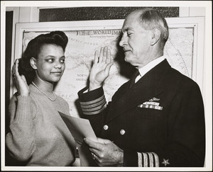First Negro WAVE in USA being sworn in by Captain Causey at IND Headquarters