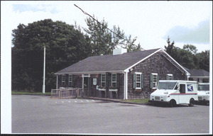 Yarmouth Port Post Office with mail trucks parked beside the building, 231 Old King's Highway, Yarmouth Port, Mass.