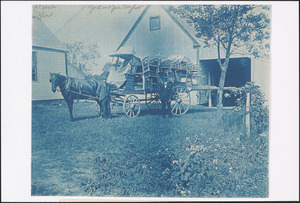Alfred Taylor, left, and Daniel Taylor, right, with cartload of chairs