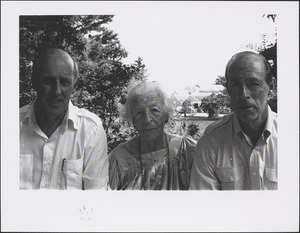John, Ann, and Michael Maxtone-Graham with the River House in background