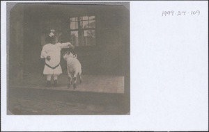 Guido Perera as a child with a lamb