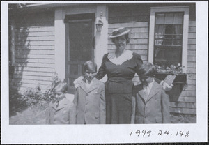 Faith (Phillips) Perera with her three sons in front of Land's End Cottage, 268 Old King's Highway, Yarmouth Port, Mass.