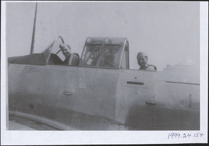 Guido Perera, on the right, in the cockpit of a plane