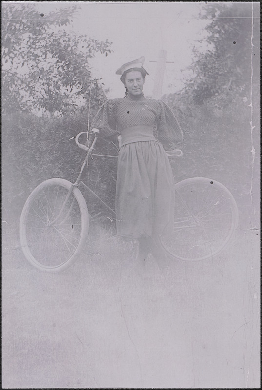Caroline (Thacher) Harris with bicycle