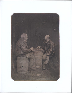 Two men playing checkers