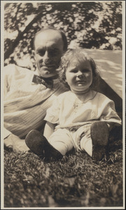 Unidentified man with child