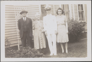 Donald Kelley in uniform with his family
