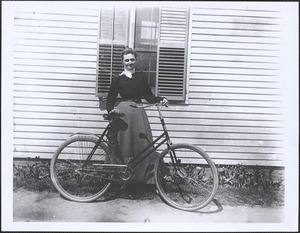 Unidentified woman with bicycle