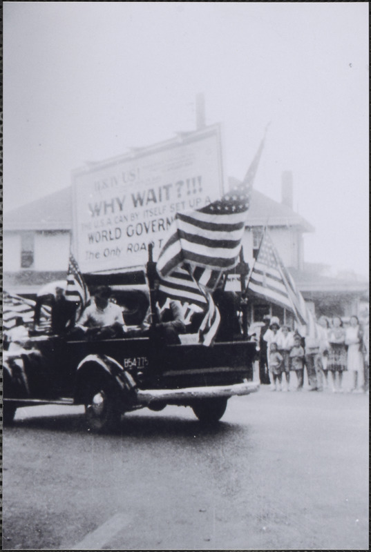 Parade passing by Hyannis Depot Digital Commonwealth