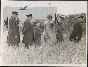 Edward Dow, 13, tours ground of murder home