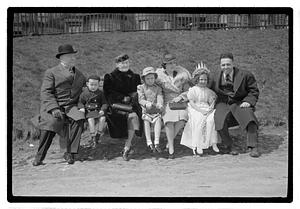 Boston Park Department Commissioner William Long on left sitting with a group of people, Boston Common