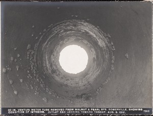 Distribution Department, Low Service Pipe Lines, 30-inch Venturi meter tube removed from Walnut and Pearl Streets, showing condition of interior; outlet end looking toward throat, Somerville, Mass., Aug. 9, 1916