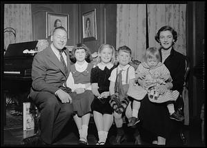 Group seated on sofa