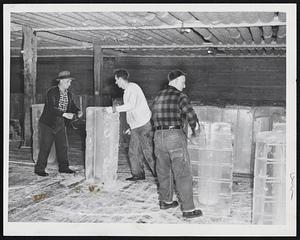 Rather be working at the coolest job in town in lower photo made at Roxbury plant of the Boston Ice Co.