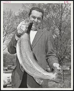 First Entry in new Fresh Water Sportfishing award program of state division of fisheries and game was this 12-pound, 32-inch brown trout taken Sunday by Hemming Johnson of Holden spincasting from shore in Wachusett reservoir, West Boylston.