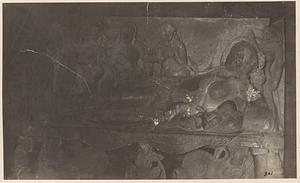 Wall carving of reclining female deity