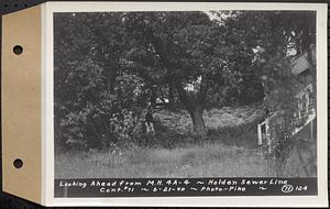 Contract No. 71, WPA Sewer Construction, Holden, looking ahead from manhole 4A-4, Holden Sewer Line, Holden, Mass., Jun. 21, 1940