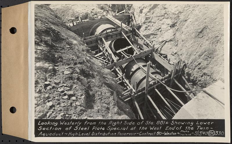 Contract No. 80, High Level Distribution Reservoir, Weston, looking westerly from the right side of Sta. 881+/- showing lower section of steel plate special at the west end of the twin aqueduct, high level distribution reservoir, Weston, Mass., May 13, 1940