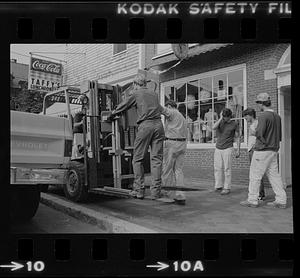 Group with forklift near Taffy's Luncheonette