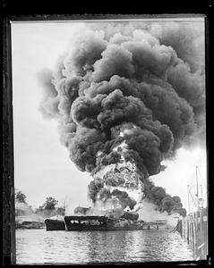 Smoke rising from a burning barge