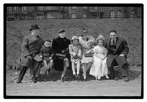 Boston Park Department Commissioner William Long on left sitting with a group of people, Boston Common