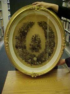 Embroidered wreath in frame