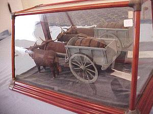 American folk art carved oxen and cart
