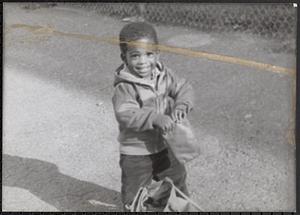Young boy smiling for the camera