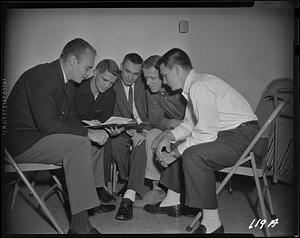 Group looking at some papers