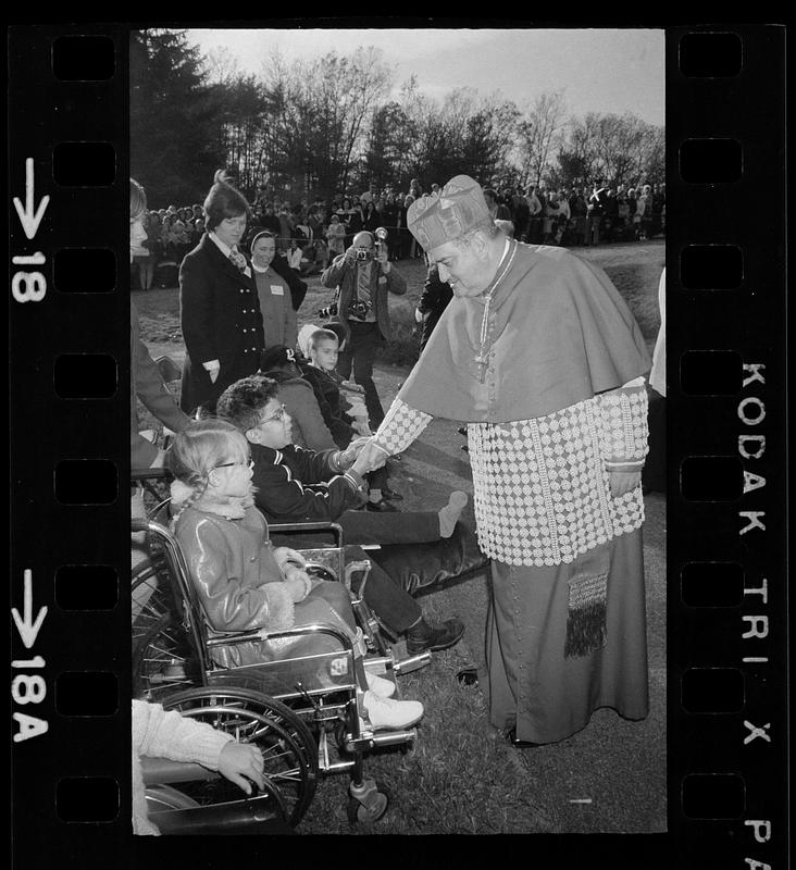 Cardinal Medeiros greets crippled children, Brighton