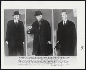 Foreign Ministers Confer - Big Three foreign ministers began their most critical diplomatic talks since the war in London today, with Germany the big problem. Shown leaving the British foreign office after the special Sunday session are, left to right: Dean Acheson, United States; Robert Schuman, France; Anthony Eden, Great Britain.