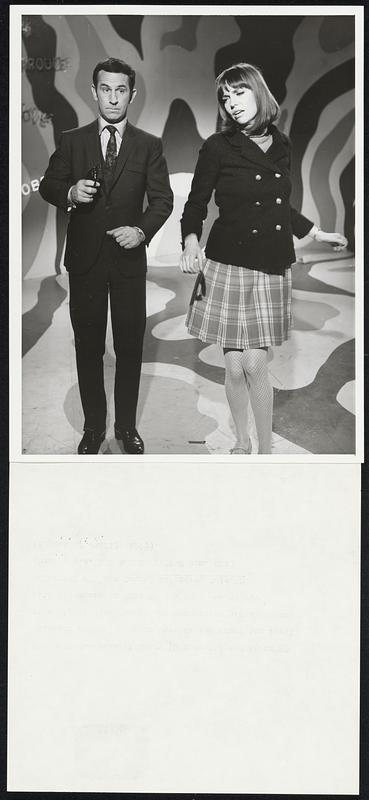 Mesmerized---Maxwell Smart (Don Smart) and Agent 99 (Barbara Feldon) seem to have fallen under the spell of a hippie disk jockey who hypnotized his listeners with his music in "The Groovy Guru" on NBC-TV's colorcast of "Get Smart" Saturday, July 20 (8:30-9 p.m. PDT & EDT; 7:30-8 p.m. CDT). (Repeat of Jan. 13, 1968).