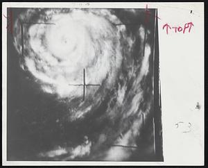 Approaching Storms are photographed as huge cloud patterns by the Tiros weather satellite. The data is recorded by signal on earth where photographs are made. Nimbus satellite is expected to do even better job.