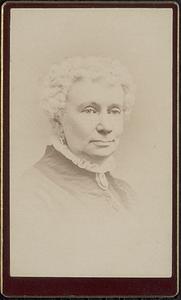 Portrait of older woman with curly hair