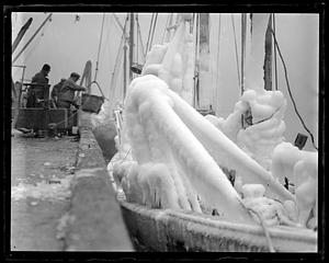 Unloading fish from ice-covered boats