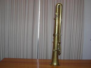 Tall conical brass form with stops