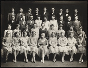 Portrait of large group dressed in fine clothing
