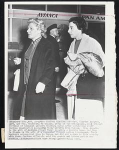 New York, Nov. 21--After Customs Examination--Mrs. Clarice Accardo, left, and Mrs. Henrietta De Grazio, wives of two Chicagoans, walk through corridor of Idlewild airport building today after undergoing stiff customs examination following their arrival from Europe. Mrs. Accardo is the wife of Anthony (Tough Tony) Accardo, a rackets boss, and Mrs. De Grazio is the wife of a suspended Chicago police lieutenant. Their husbands accompanied them to Europe but did not return to this country with them. Customs officials said the search and interrogation was routine.