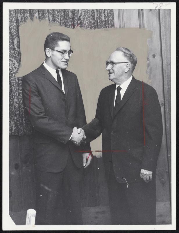 50 years separate these Natick High Football captains. Cliff Cotair, 1961 captain, meets his prototype of 1911, John (Frank) Sheehan. The 1911 Natick team, one of the most powerful school teams ever assembled, was honored last night at Ken’s Steak House in Framingham.