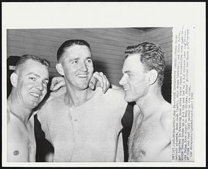 Three Consecutive Homers -- Three Happy Detroit players, Norm Cash (left), Dick Brown (center), and Steve Boros, get together in dressing room after their three consecutive home runs in ninth inning broke up a 2-2 tie and led to a 5-2 victory over the Minnesota Twins last night in Twin Cities. Twins; pitcher Ray Moore gave up two of them and Paul Giel served up the other.