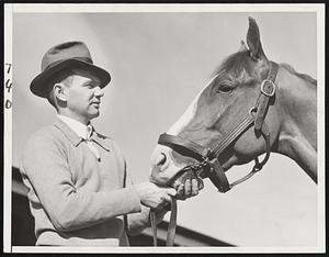 Noted Jockey Now Training Race Horse Arcadia, Calif. Photo Shows- Earle Sande, famous race jockey and The Chief, noted race horse that has been nominated for the running of the Santa Anita Handicap, a $100,000 race. The Chief is owned by Maxwell Howard and Sande is training him and looking forward and hopes for victory in the fourth running of the great Santa Anita Derby.