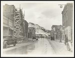 Wreckage of 'Quake-Rocked Buildings. Helena, Mont., Nov. 6 -- Here's South Main Street, where stone and brick buildings were erected when last chance gulch became a city instead of a mining camp, as it appeared after structures had crumpled under earthquake shocks and the work of rebuilding was started.